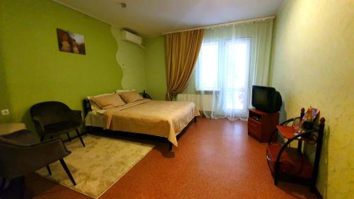 Una cama o camas en una habitación de ACAPULCO