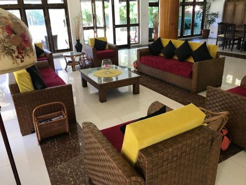 Un lugar para sentarse en Palm Beach Villa