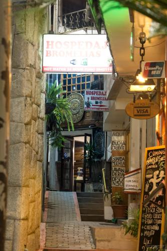 an entrance to a building with plants in the doorway at Gringo Bill's Boutique Hotel in Machu Picchu