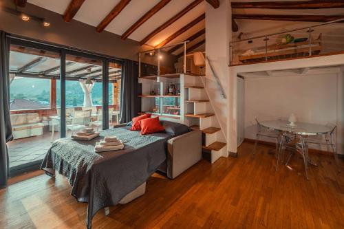 Ένα ή περισσότερα κρεβάτια σε δωμάτιο στο Casa Aurelio Wellness Suite & Spa Inclusive