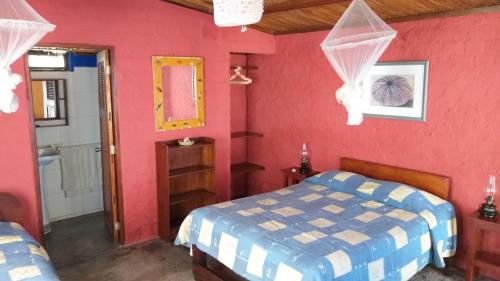 Ένα ή περισσότερα κρεβάτια σε δωμάτιο στο Hotel Las Aldas