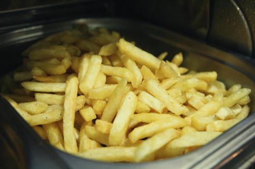 a bunch of french fries in a pan at Hotel Ney in Konya