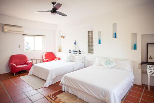 Ένα ή περισσότερα κρεβάτια σε δωμάτιο στο Summer Ya B&B