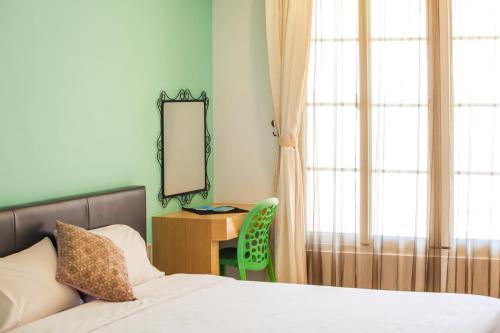 Ένα ή περισσότερα κρεβάτια σε δωμάτιο στο Summer Ya B&B
