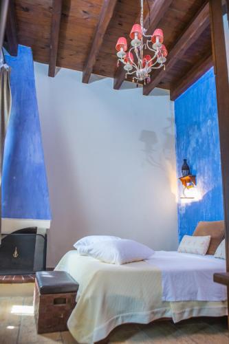 Postel nebo postele na pokoji v ubytování Oikoperiigitis Hotel