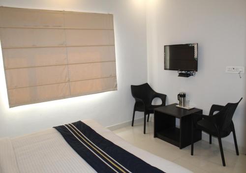 TV a/nebo společenská místnost v ubytování HOTEL SHIVAYE
