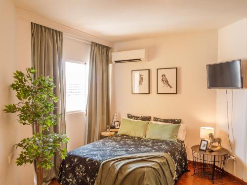 A bed or beds in a room at Amazing Studio Torremolinos