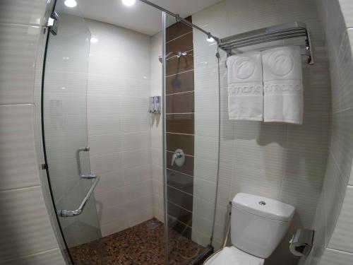 A bathroom at d'primahotel Melawai - Blok M