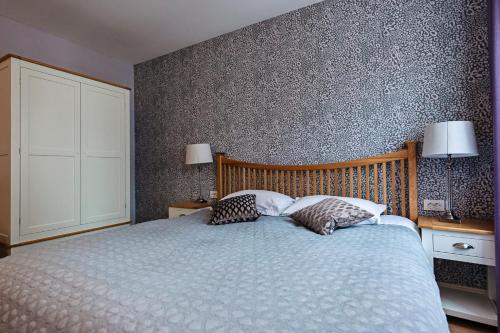 Katil atau katil-katil dalam bilik di Predela LUX Aparthotel