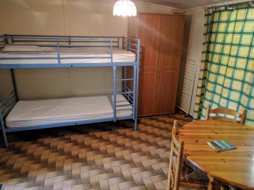 Postel nebo postele na pokoji v ubytování Les Plans