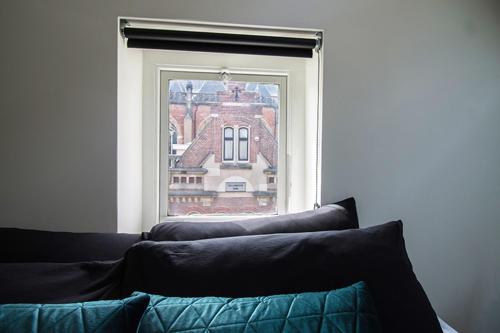 two pillows sitting in front of a window at Citystays Deventer in Deventer