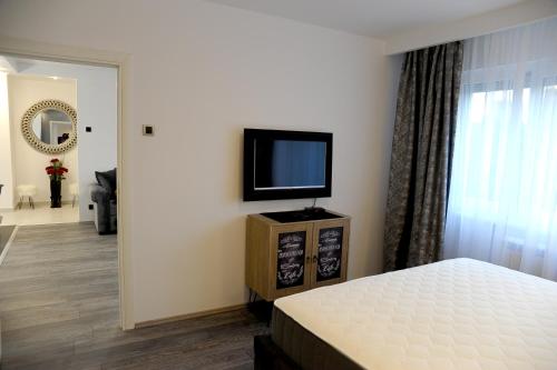 Televisyen dan/atau pusat hiburan di Apartment A