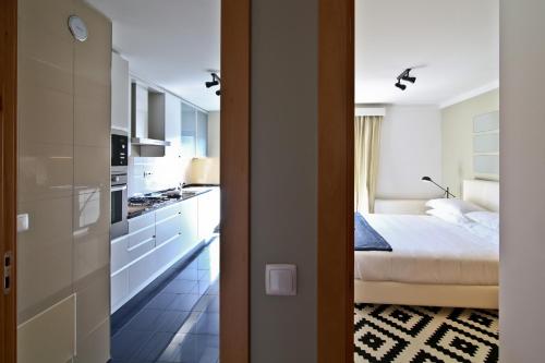 Ένα ή περισσότερα κρεβάτια σε δωμάτιο στο Panoramic Living