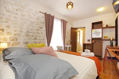 Posteľ alebo postele v izbe v ubytovaní TowerHouseSasso