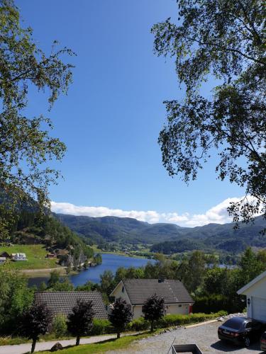 a view of a river from a house at Dada Apartment in Hjelmeland