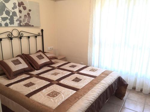 Postel nebo postele na pokoji v ubytování Adosado en Islantilla Golf Resort