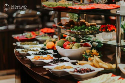 a buffet line with many different types of food at Dreamland Oasis Hotel Chakvi in Chakvi