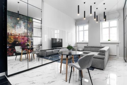 Televízia a/alebo spoločenská miestnosť v ubytovaní RentPlanet - Studio Ruska