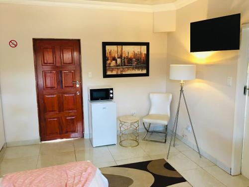 Televisyen dan/atau pusat hiburan di Riverton Manor