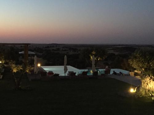 a view from the roof of a house at night at Vistas - Herdade do Zambujal in Castro Verde