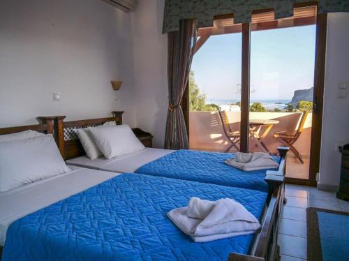 Postel nebo postele na pokoji v ubytování Luxury Villa Ioannis