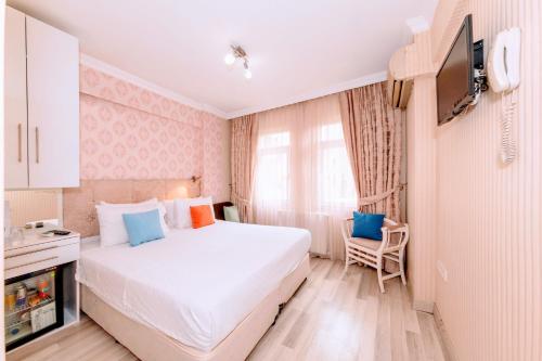 Cama o camas de una habitación en Walnut Shell Hotel Sultanahmet