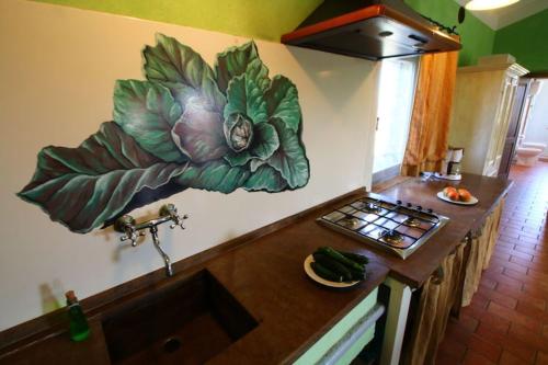 Dapur atau dapur kecil di Le More E I Gelsomini
