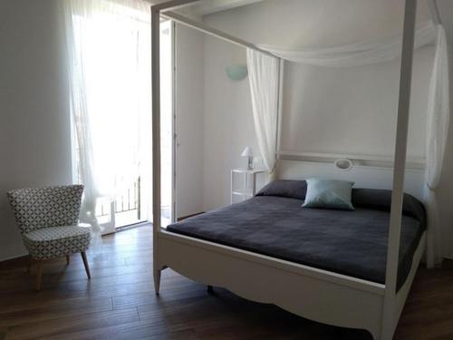 A bed or beds in a room at La Torre