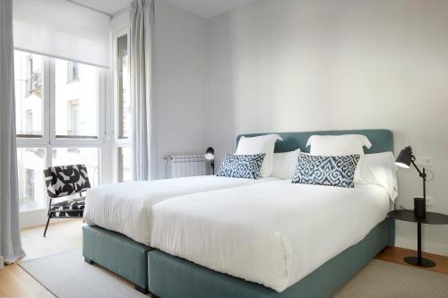 Posteľ alebo postele v izbe v ubytovaní Muinoa 5 by FeelFree Rentals
