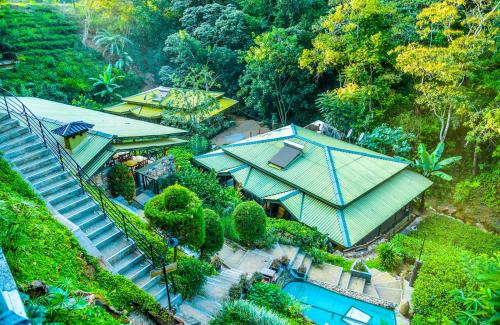 an aerial view of a house with a swimming pool at Train View Chalet in Bandarawela