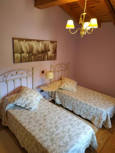 Säng eller sängar i ett rum på Casa Lindelagua