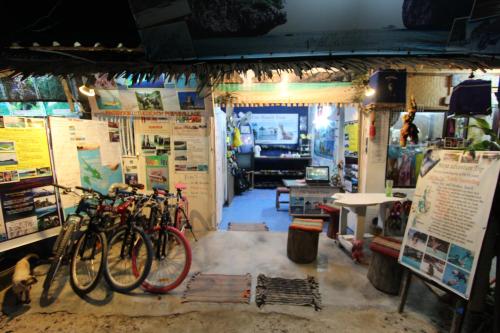 a room with two bikes parked in a shop at Phi Phi Ba Kao Bay Resort in Phi Phi Don