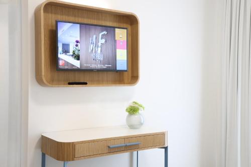 TV o dispositivi per l'intrattenimento presso M&F Hotel