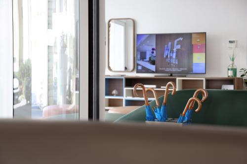 TV o dispositivi per l'intrattenimento presso M&F Hotel