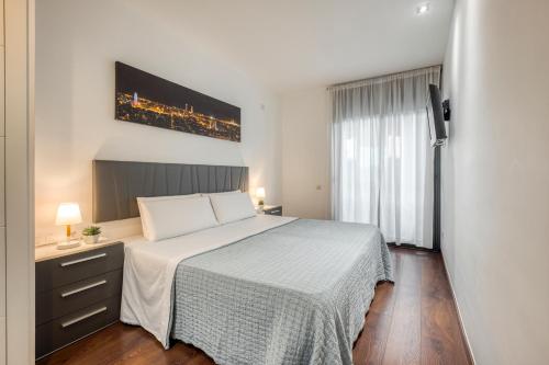 Cama o camas de una habitación en Gracia Bas Apartments Barcelona