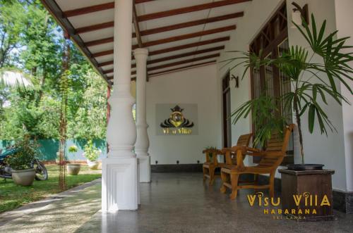 Un jardín fuera de VISU VILLA hotel
