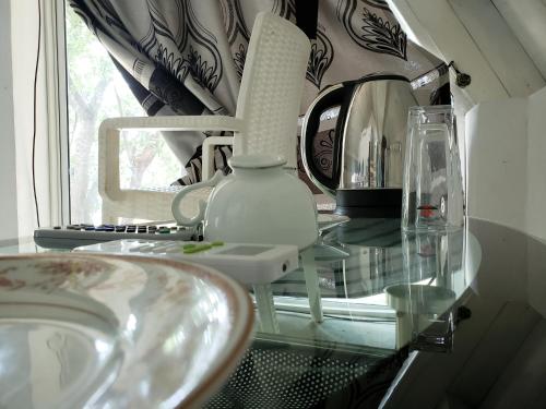 a bathroom counter with a sink and a mirror at Samabe Lake in Dambulla