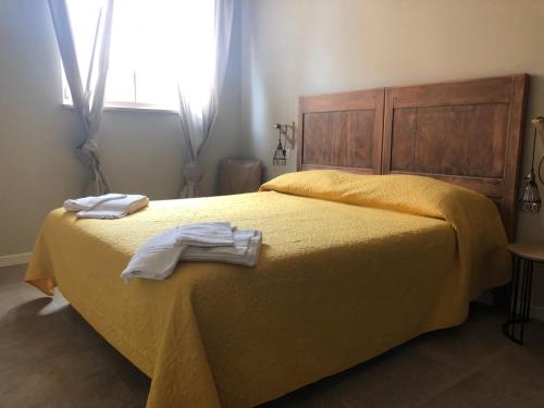 Ein Bett oder Betten in einem Zimmer der Unterkunft Casa Lazise
