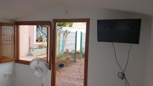TV a/nebo společenská místnost v ubytování Chalet Anagato