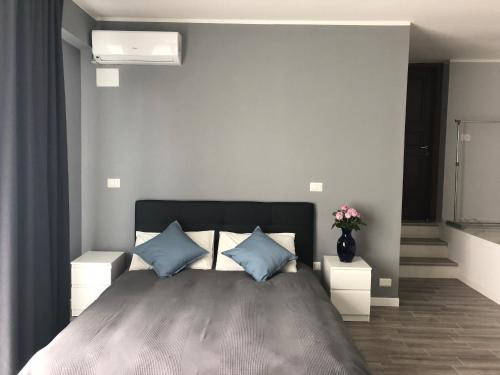 Postel nebo postele na pokoji v ubytování B&B Le Palme