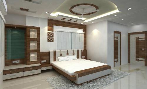Ένα ή περισσότερα κρεβάτια σε δωμάτιο στο Hotel Shree Hari