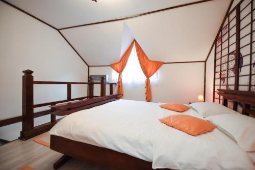 Tempat tidur dalam kamar di Casa Lily - Japanese Retreat