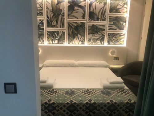 Ein Bett oder Betten in einem Zimmer der Unterkunft Hotel Playa de la Plata