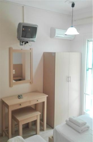 Televisyen dan/atau pusat hiburan di Dinos Green Place