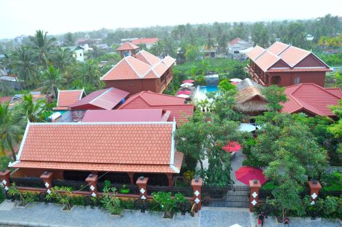 an aerial view of a resort with red roofs at Delux Villa in Battambang