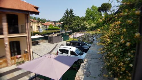 a white van parked in a driveway next to a house at Bed & Breakfast Le Due G in Varese