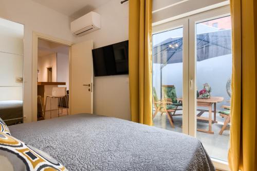 En eller flere senger på et rom på Apartments DREAM IN ARENA 1 Pula Center FREE PARKING