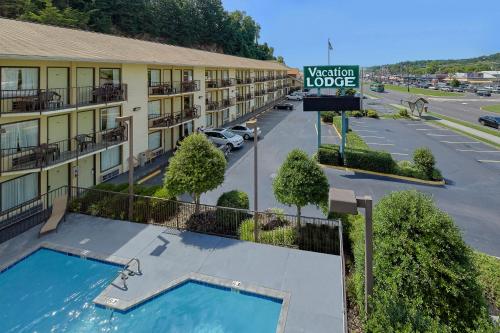 an aerial view of a hotel with a parking lot at Vacation Lodge in Pigeon Forge