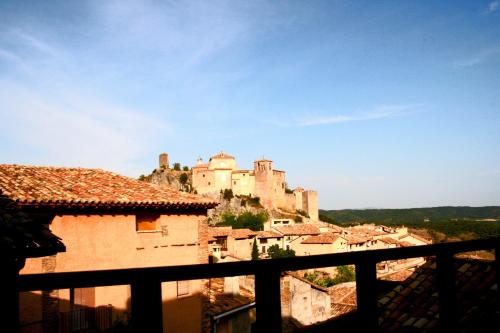 a view of a town with a castle on a hill at Hotel Castillo de Alquézar in Alquézar