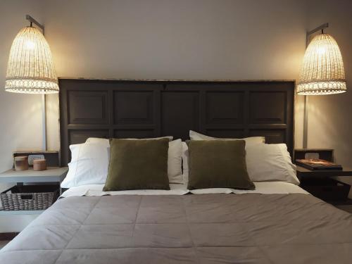 מיטה או מיטות בחדר ב-Como en casa... en gran Mendoza